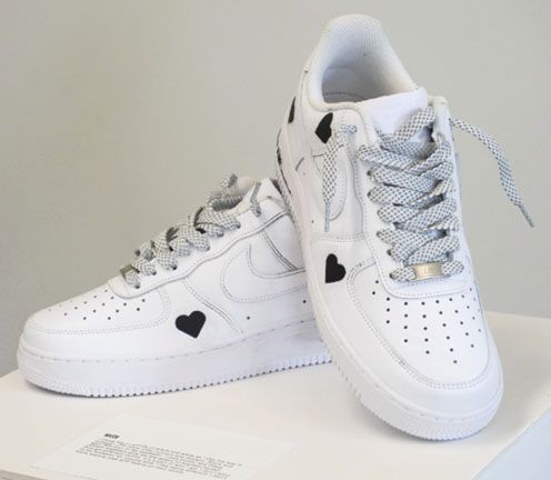 pair of shoes with kid's design