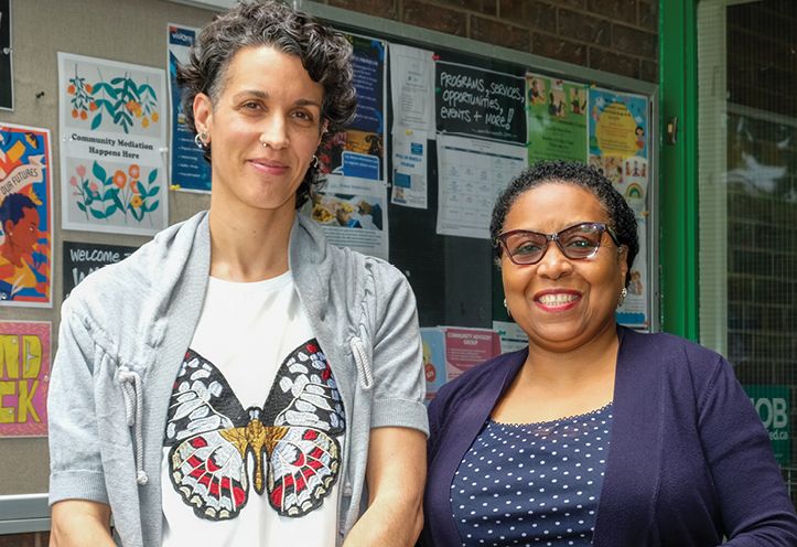 two women standing outside Warden Woods Community Centre