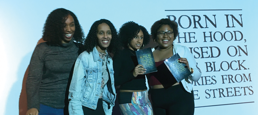 four woman posing with books "born in the hood"