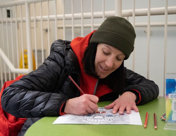 woman drawing on paper