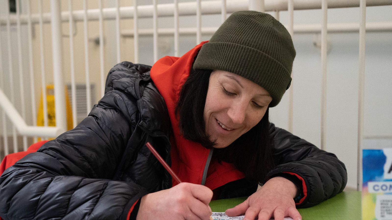 woman drawing on paper