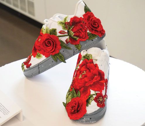 pair of shoes with kid's design