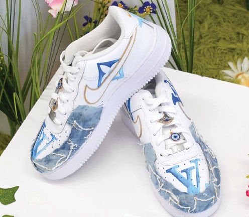 pair of shoes with kid's design