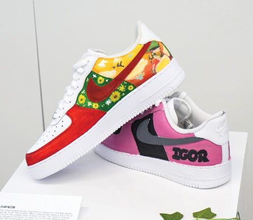 pair of shoes with kid's design