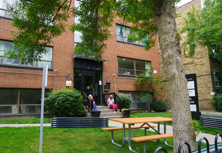 outside of apartment building in summertime