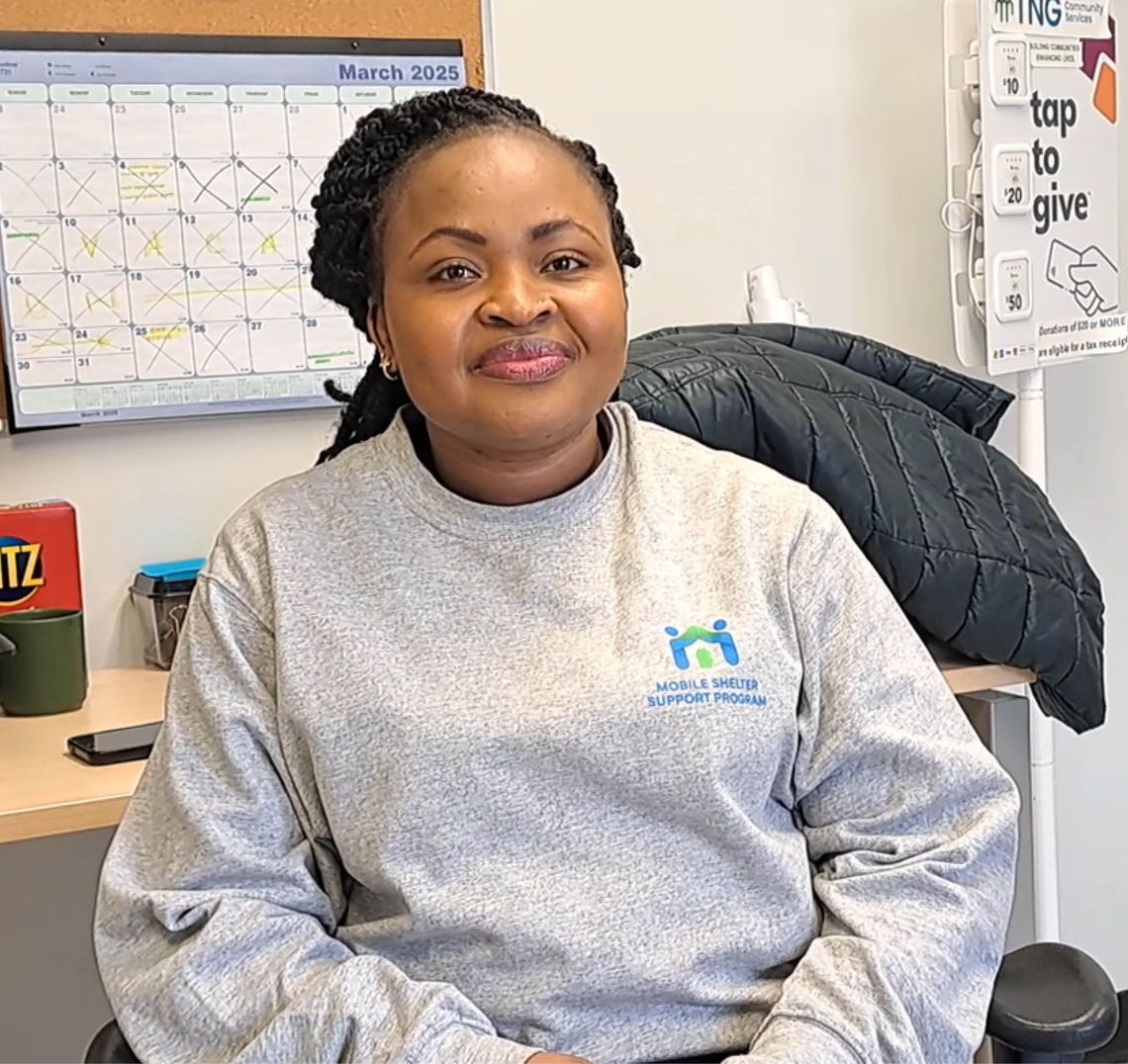woman sitting in a chair in an office