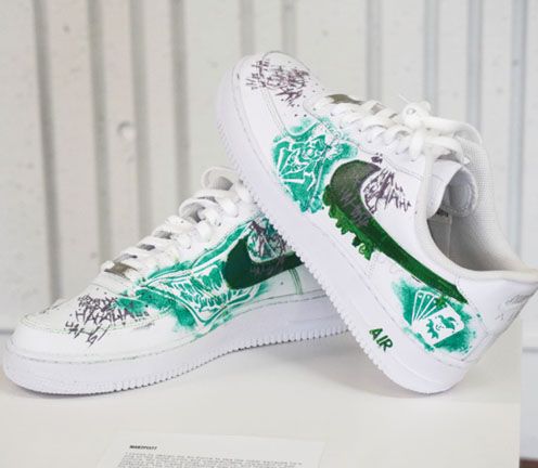 pair of shoes with kid's design