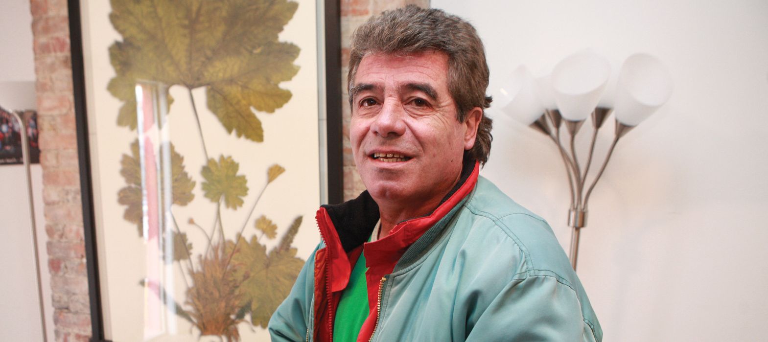 man standing in L.L. Odette Place hallway