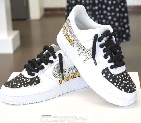 pair of shoes with kid's design