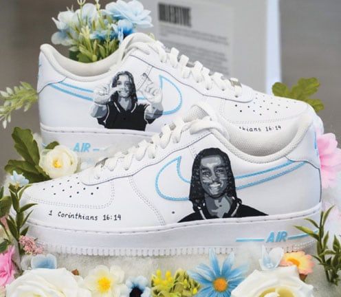 pair of shoes with kid's design