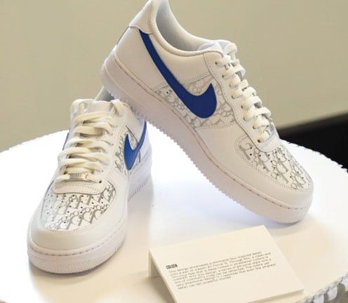 pair of shoes with kid's design