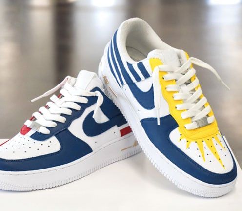 pair of shoes with kid's design