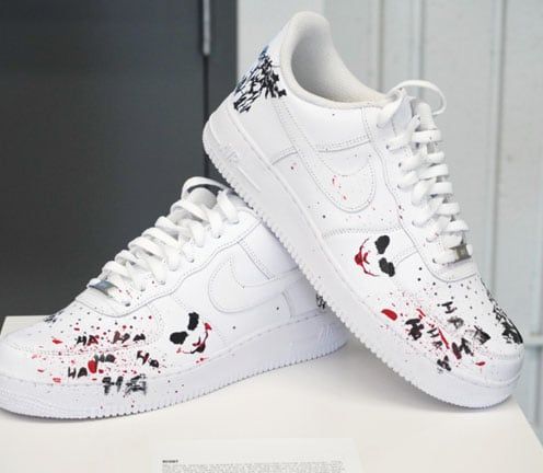 pair of shoes with kid's design