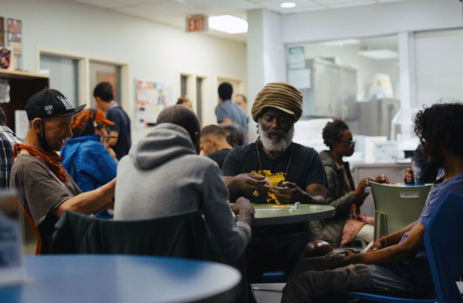 group of people sitting in the Corner Drop-in