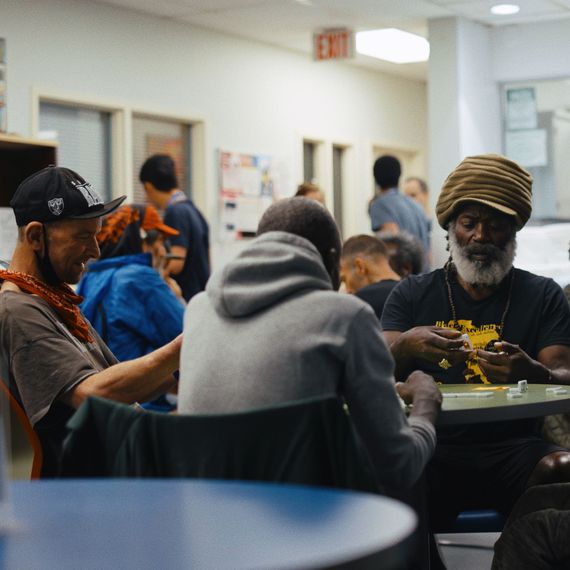 group of people sitting in the Corner Drop-in