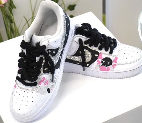 pair of shoes with kid's design