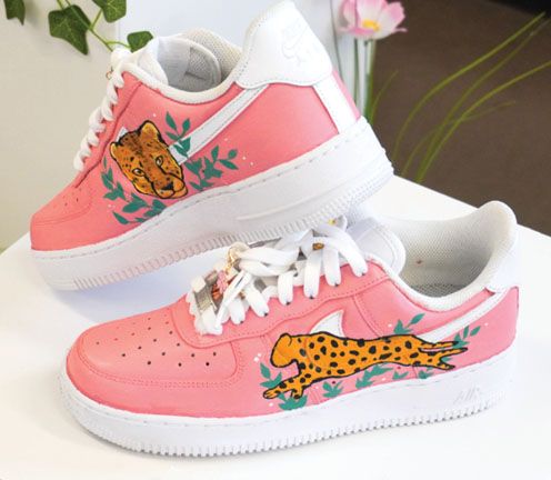 pair of shoes with kid's design