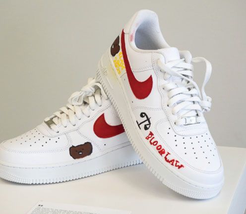 pair of shoes with kid's design